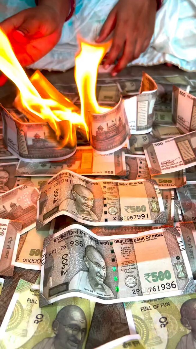 Indian witch burning money Indian witch burning money