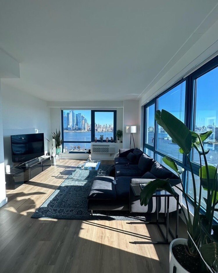 Apartment living room with city view Apartment living room with city view