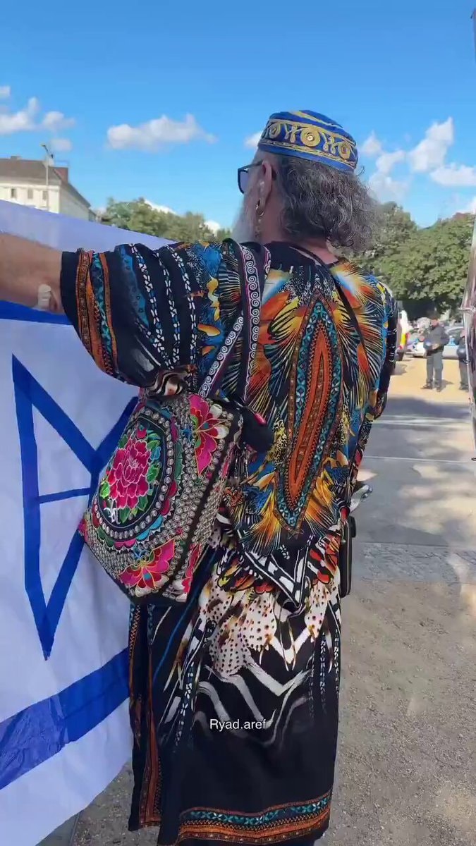 Jewish Protestant detained Berlin modified flag