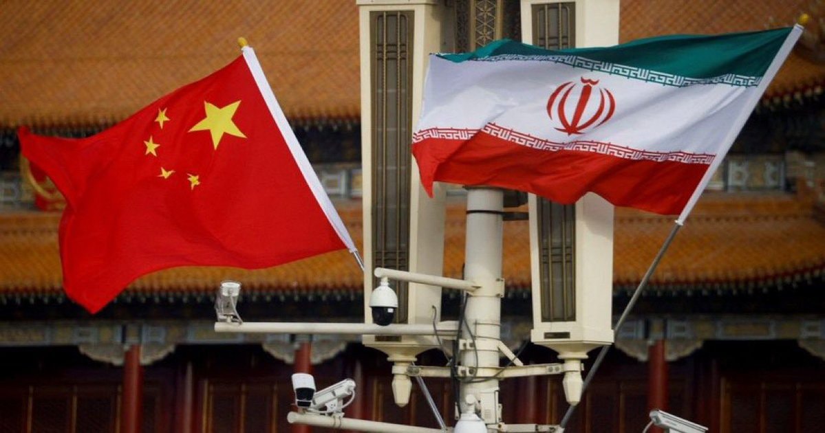 Iran and China flags at formal meeting