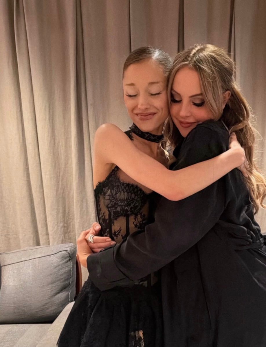 Ariana Grande and Adele hug (photo 1 of 2)