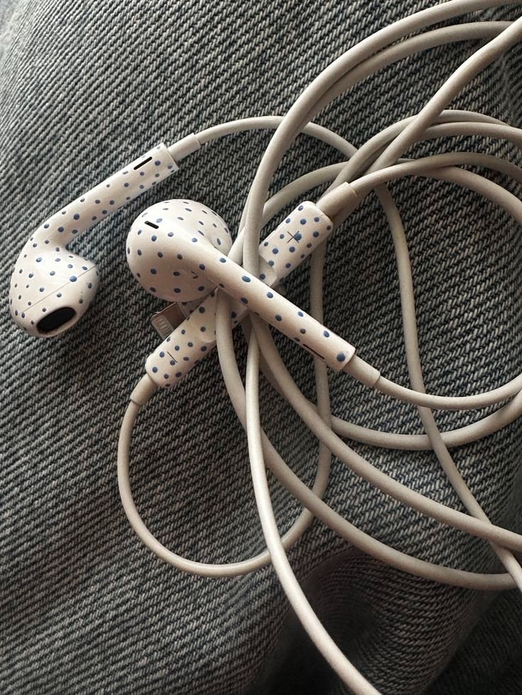 white earbuds and cable (photo 3 of 3)