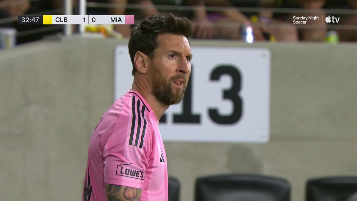 Lionel Messi in pink jersey