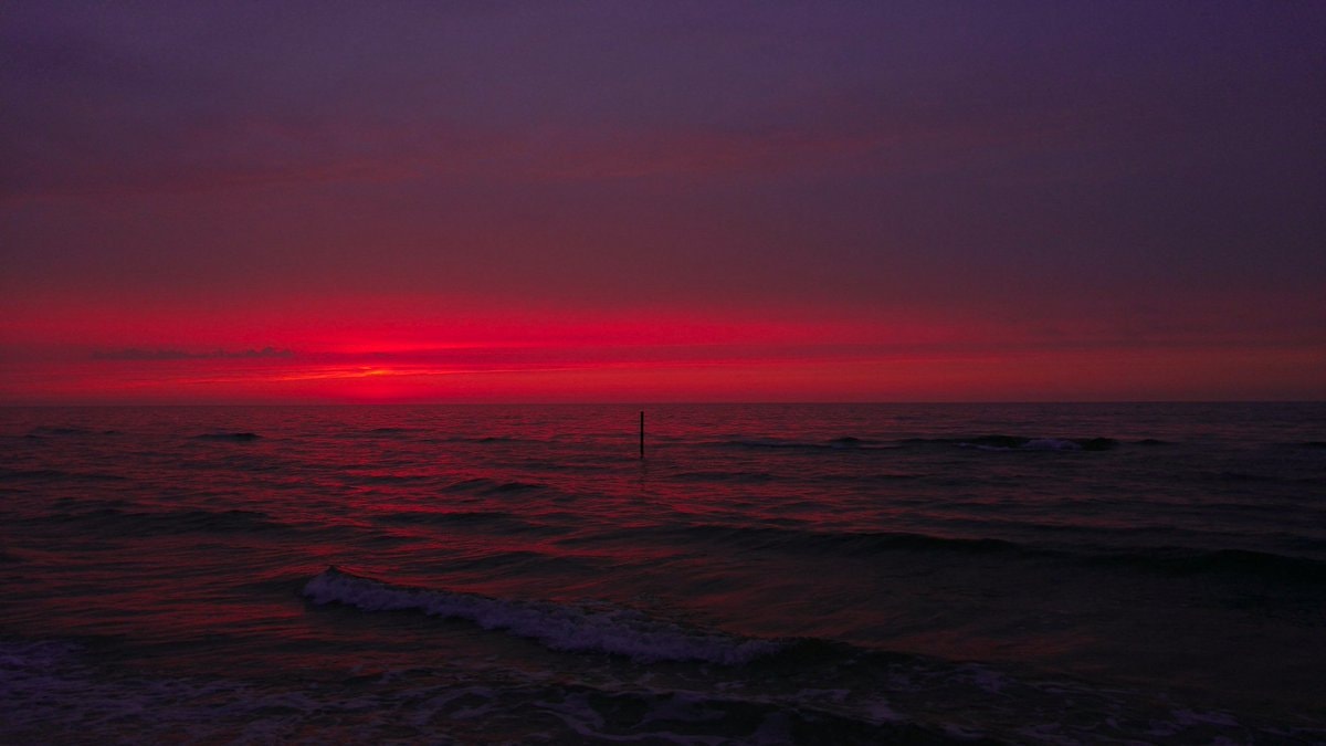 Sunset ocean red glow (photo 4 of 4)
