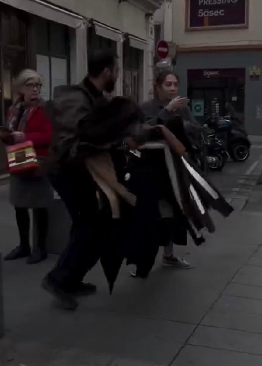 Husband returns wife's stolen clothes to store