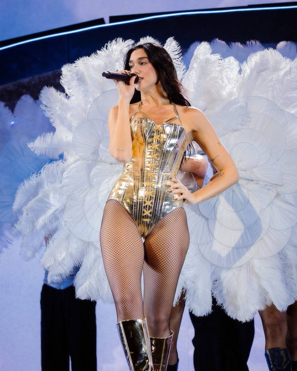 Female performer singing on stage