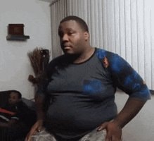 man reacting to rihanna pregnancy theory