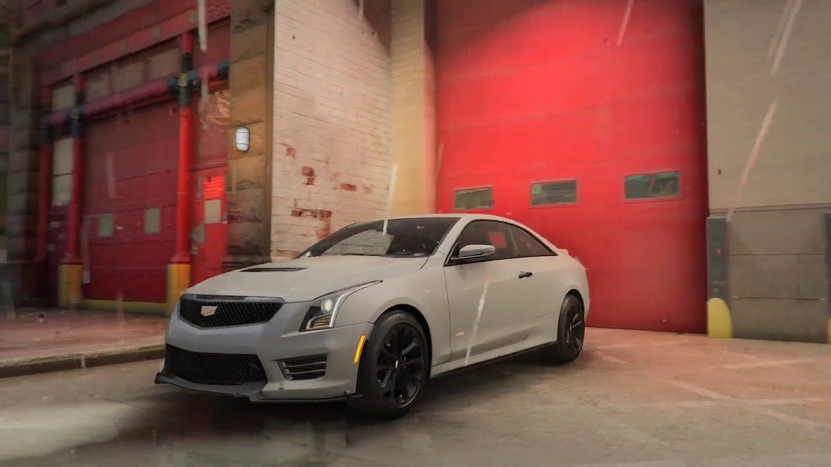 gray Cadillac coupe red garage