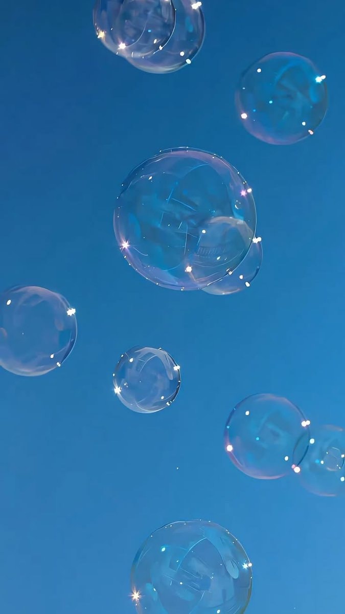 Iridescent bubbles in blue sky ✨ (photo 2 of 4)