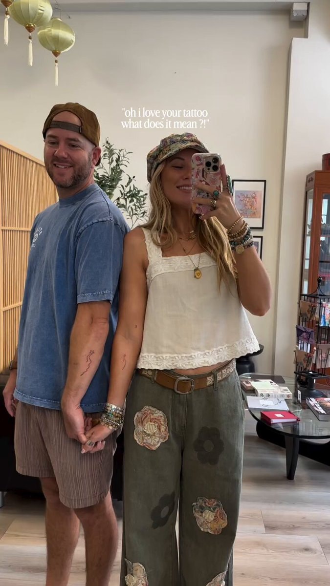 couple matching daughter tattoo