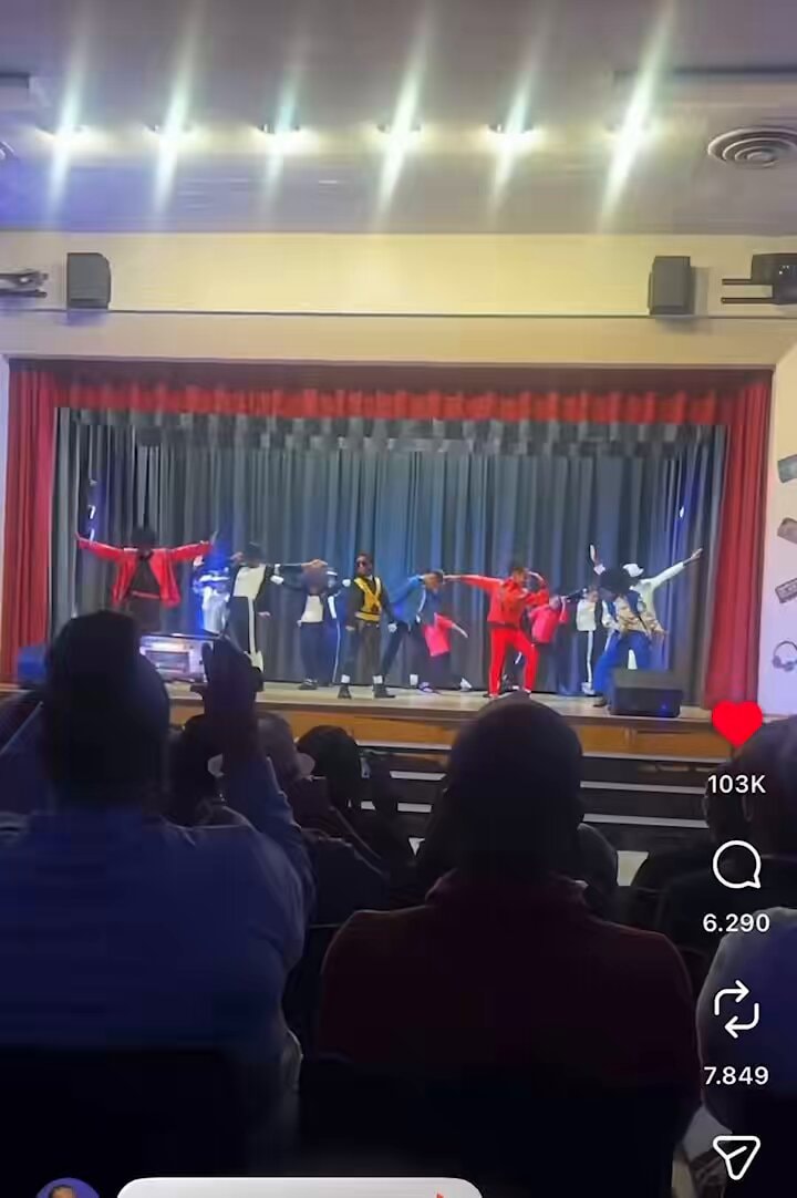 School performance dancers on stage