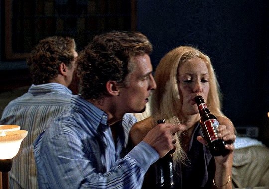 man and woman drinking beer moment