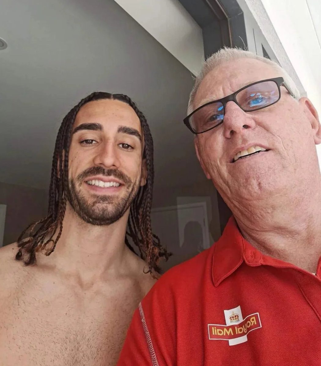 Marc Cucurella lets mailman wear World Cup medal (photo 2 of 2) Marc Cucurella lets mailman wear World Cup medal (photo 2 of 2)