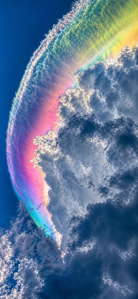 rainbow clouds against blue sky rainbow clouds against blue sky