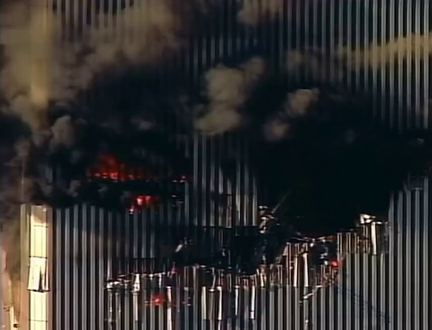 person falling from burning building