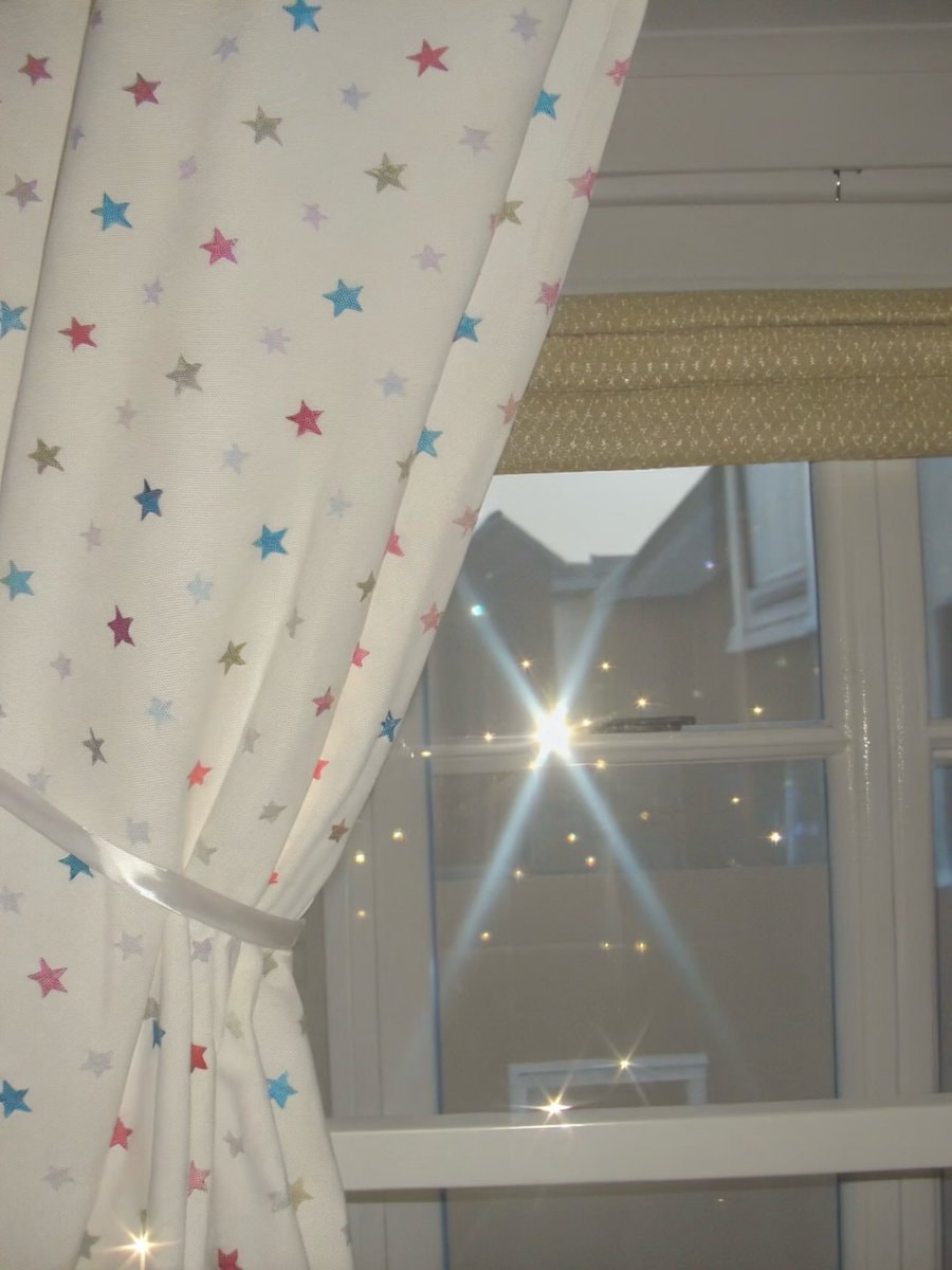 sunlight through star curtains (photo 3 of 4)