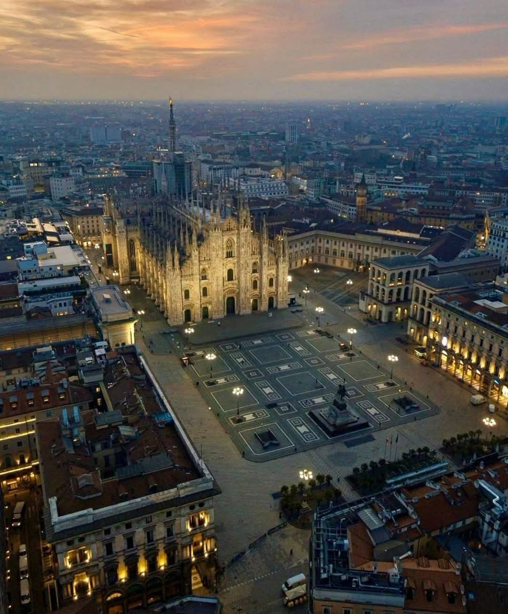 Milan Italy cathedral piazza at dusk