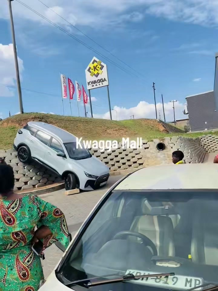 SUV stuck on wall outside Kwagga Mall