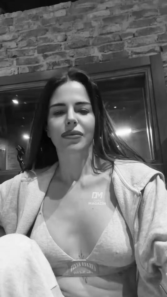 Simge Sağın black and white mic moment