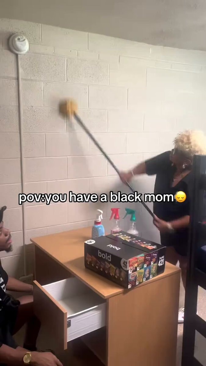 black moms cleaning moment