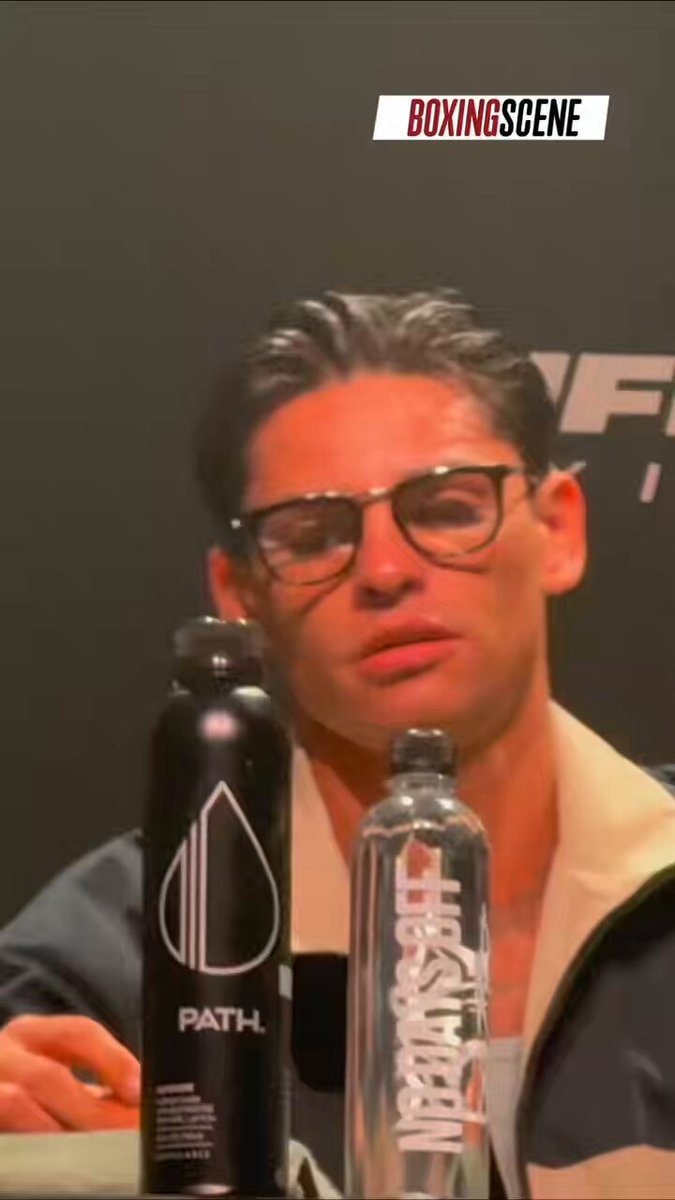 Ryan Garcia eating egg at press conference