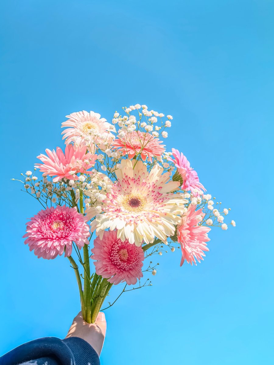 bouquet of flowers against blue sky (photo 3 of 4)