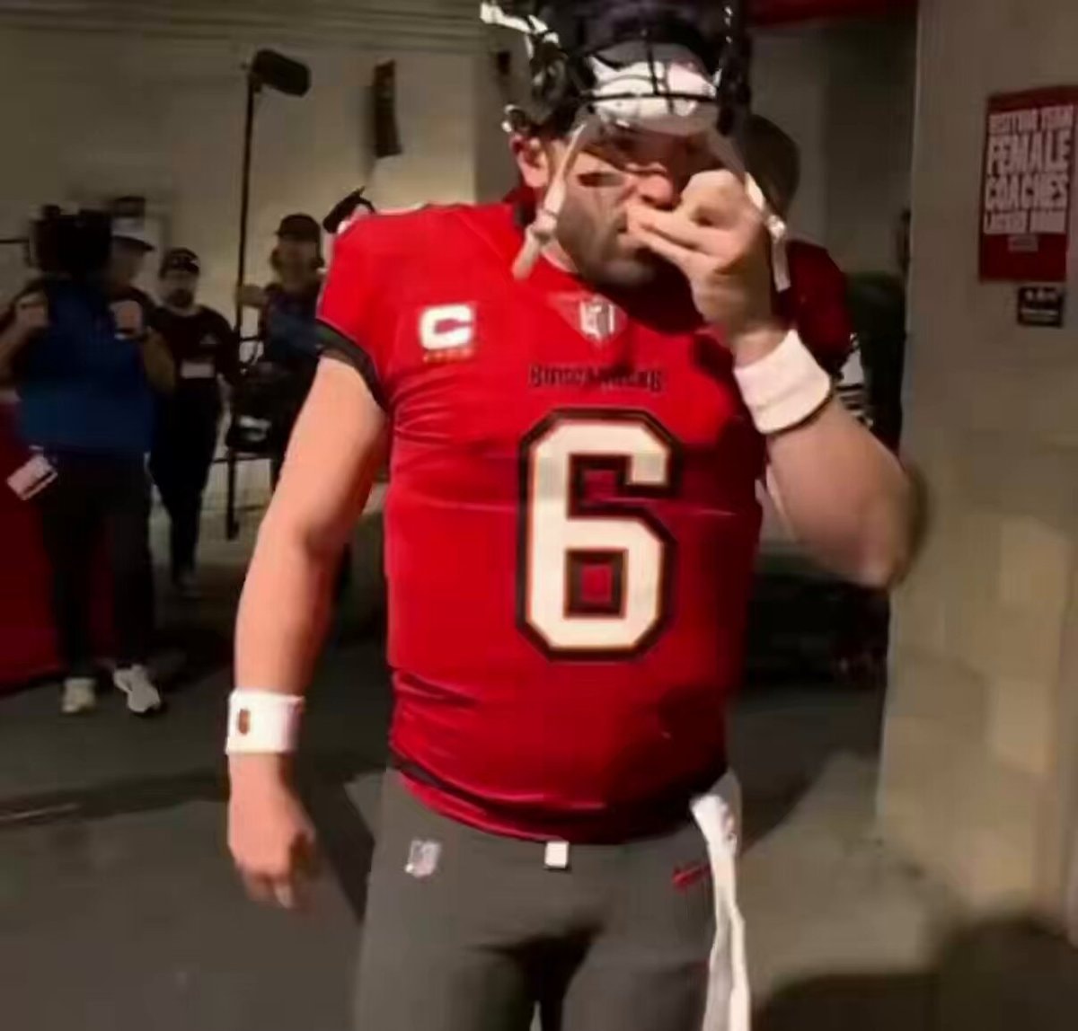 football player red jersey number 6