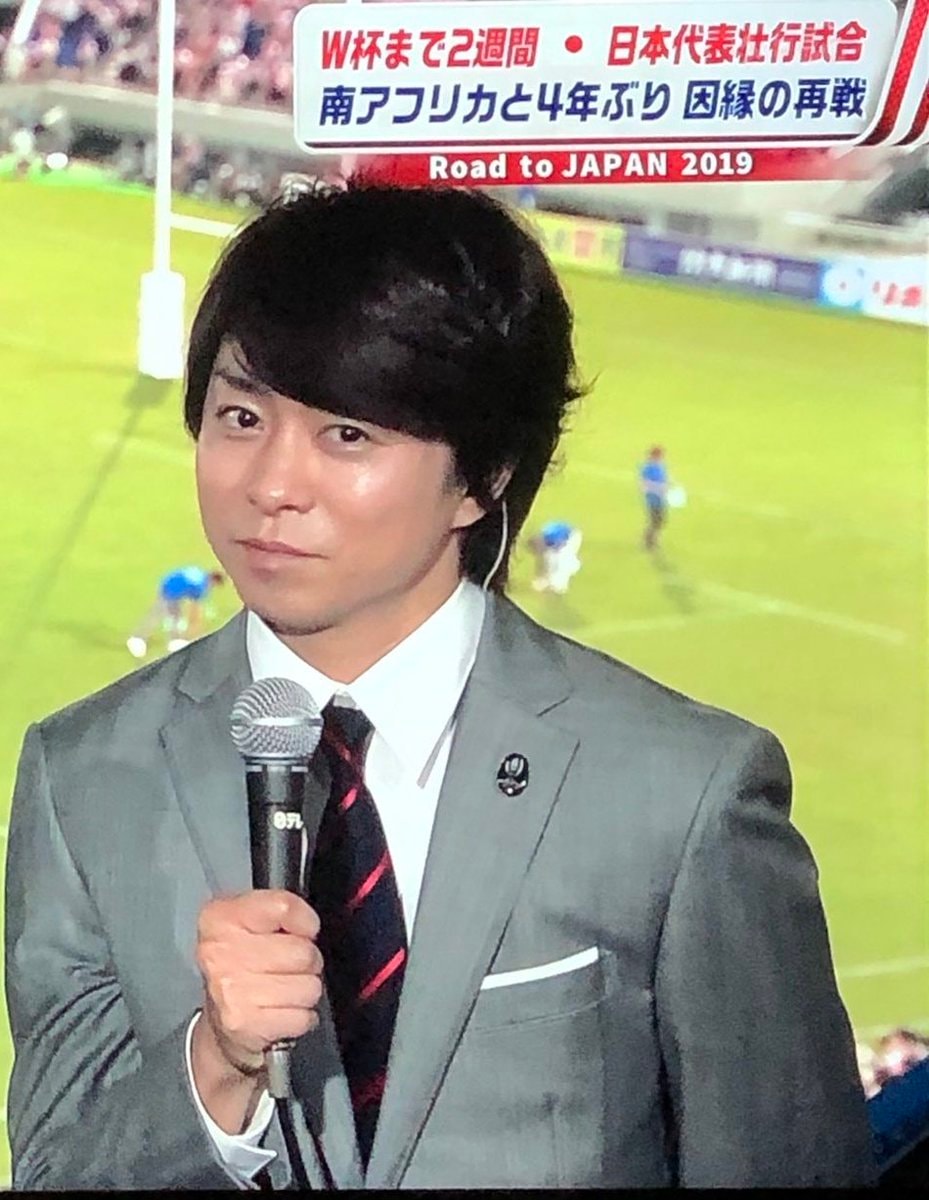 Man drinking from cup with Kazunari-san Shibuya text (photo 4 of 4)