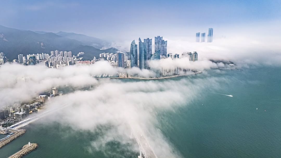 City skyline hidden by clouds (photo 4 of 4)