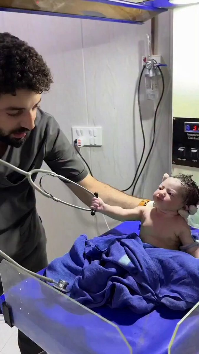 Newborn baby doctor moment
