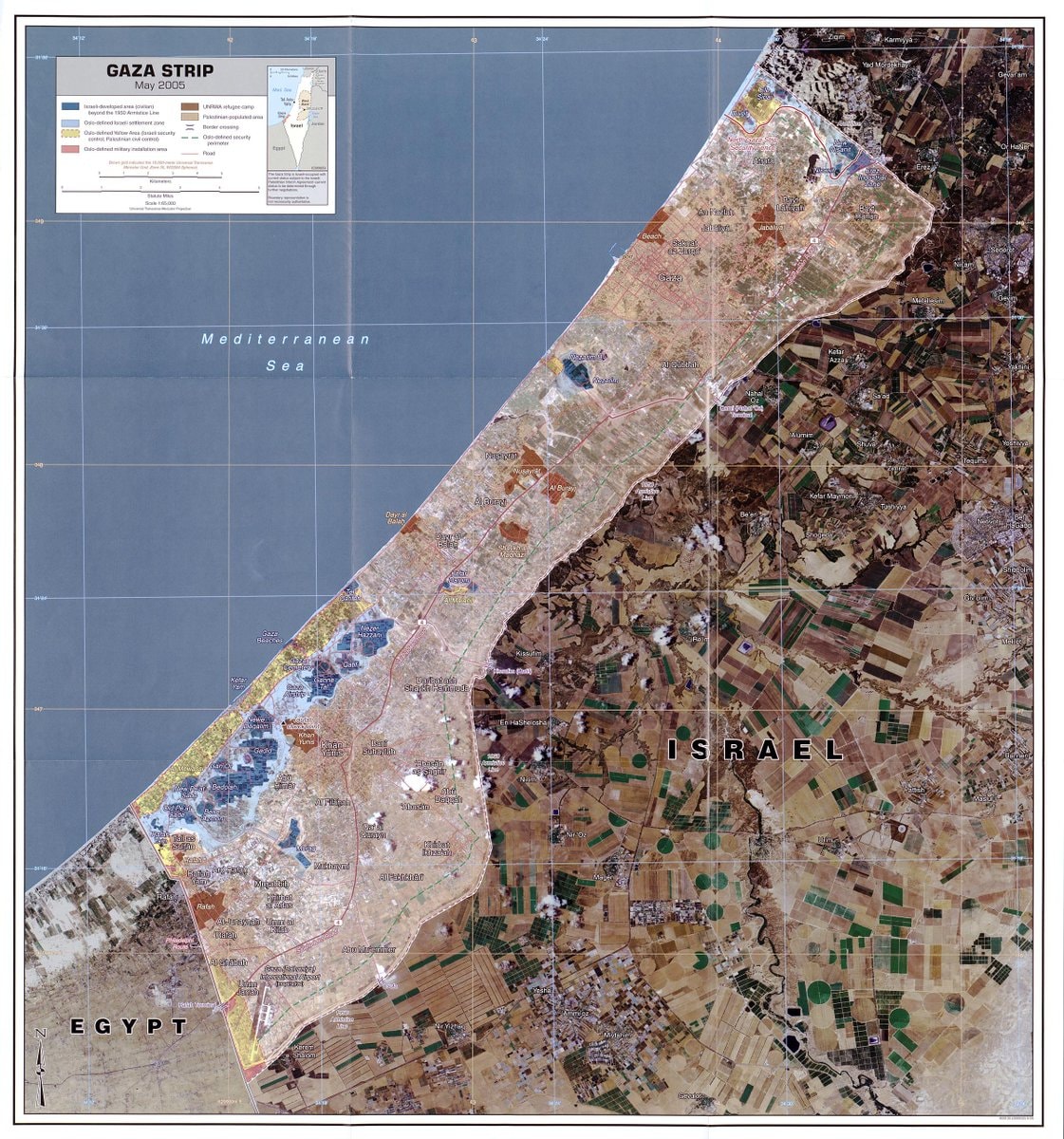 Gaza Strip rubble and tents (photo 2 of 2)