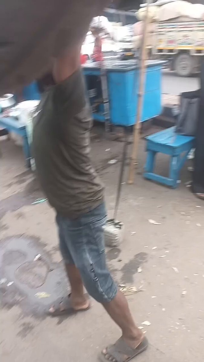 Motorcycle balanced on head in India
