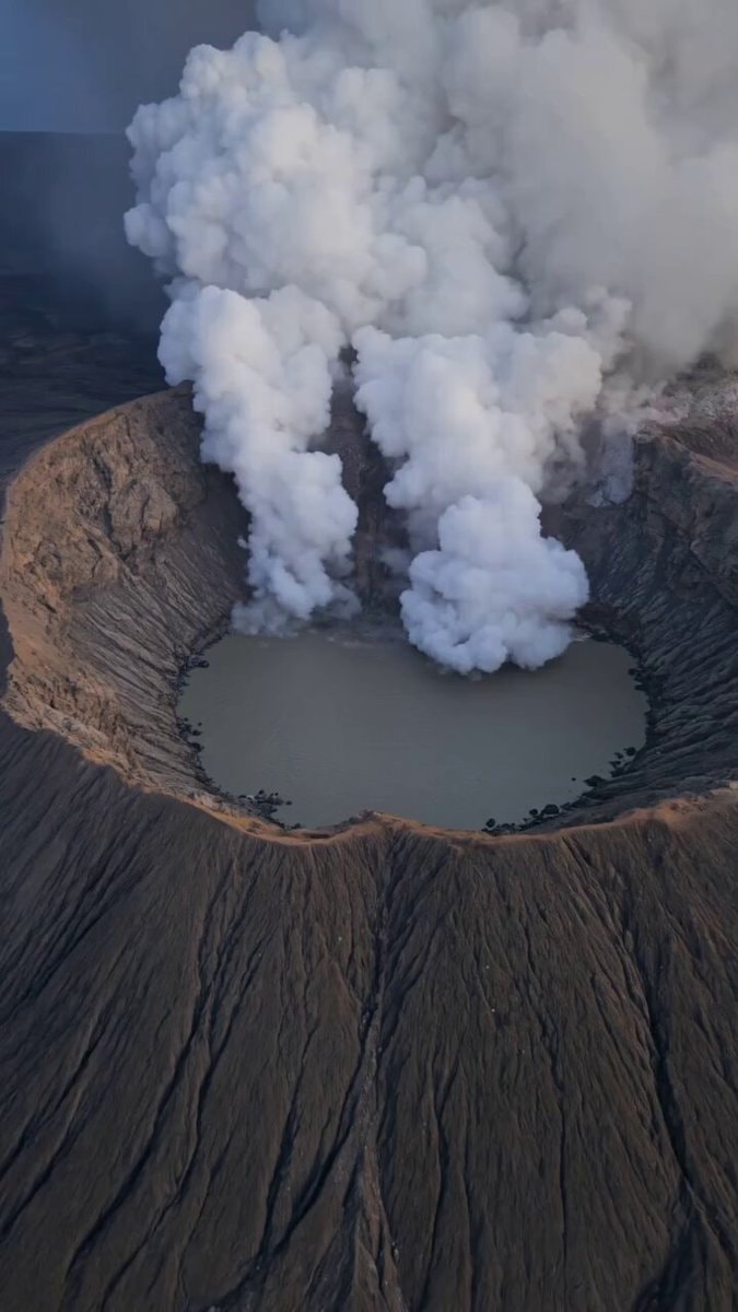 Volcanic crater magma water explosion
