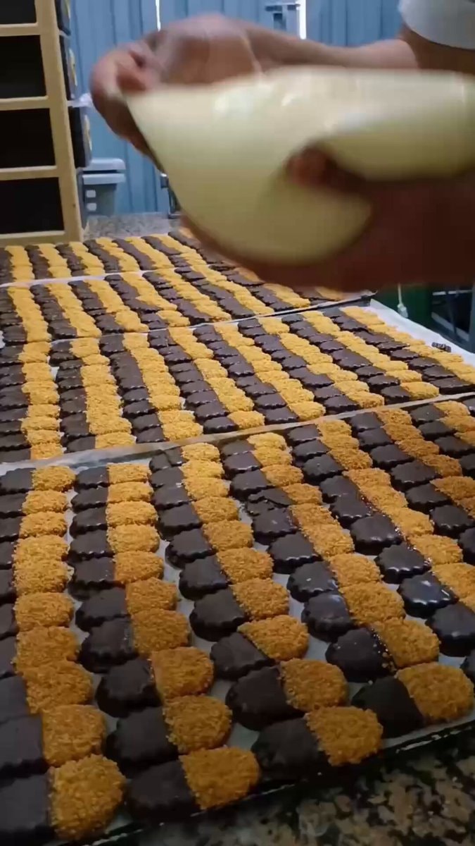 Cookie decorating with white chocolate stripes