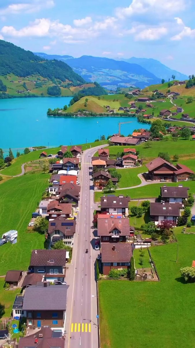 scenic village by turquoise lake