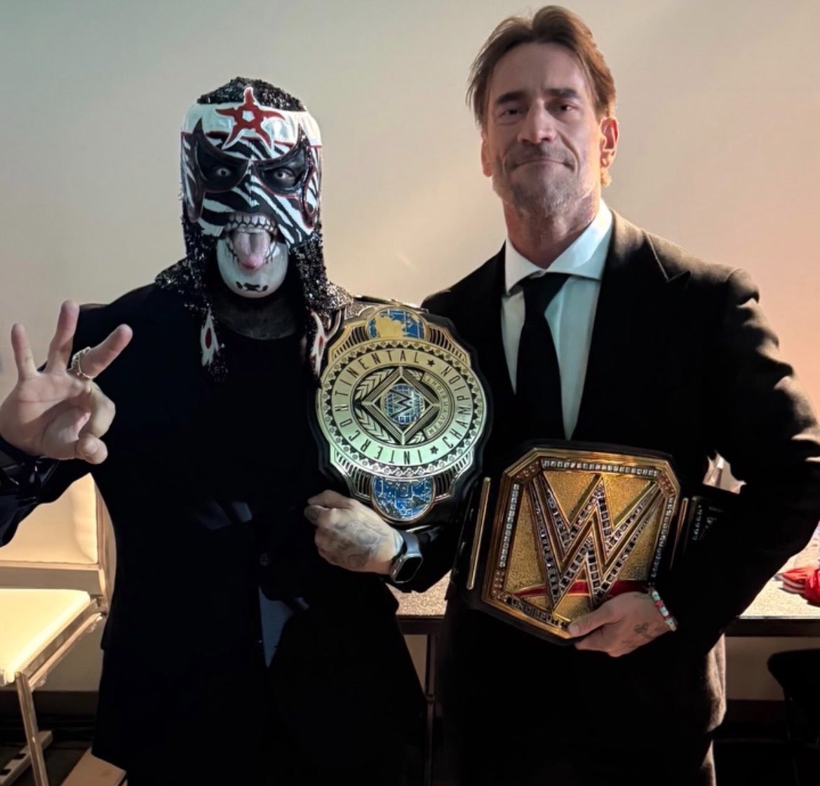 CM Punk Penta WWE belts CM Punk Penta WWE belts
