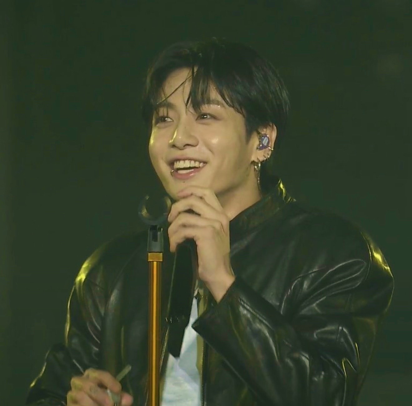 young man smiling widely