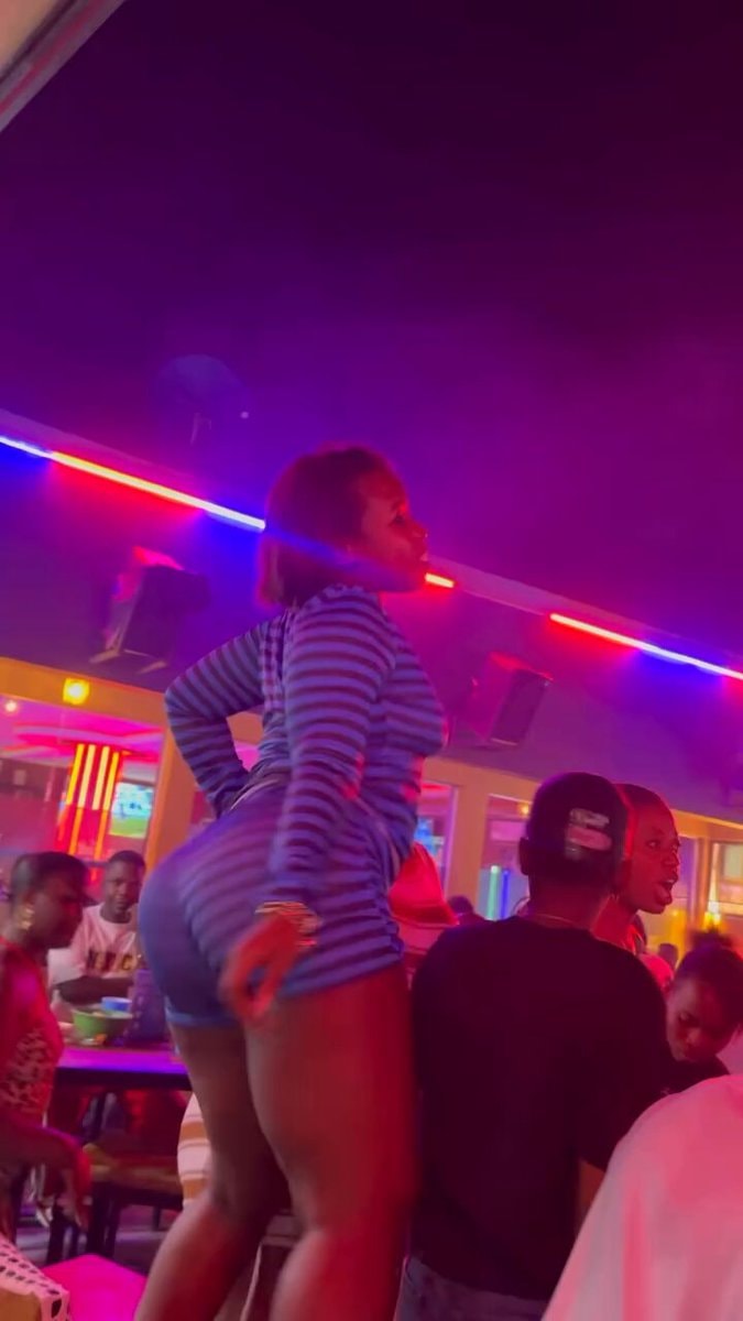 woman dancing in striped outfit