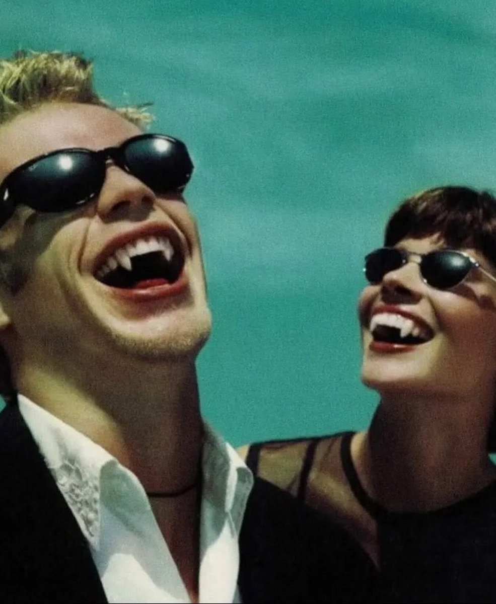 Ray-Ban vampire fangs ad 1998