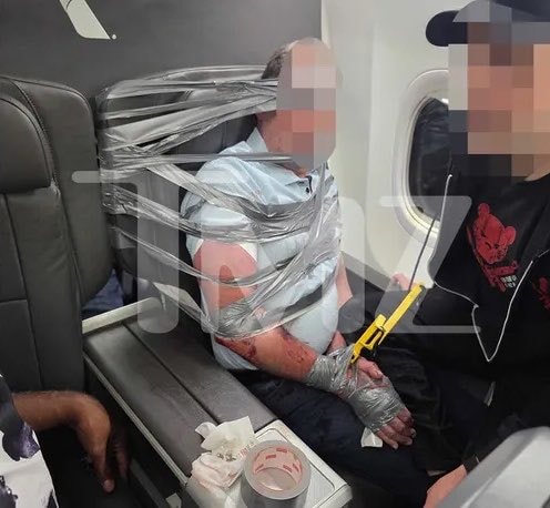 Airplane passenger restrained following alleged misconduct (photo 2 of 2)