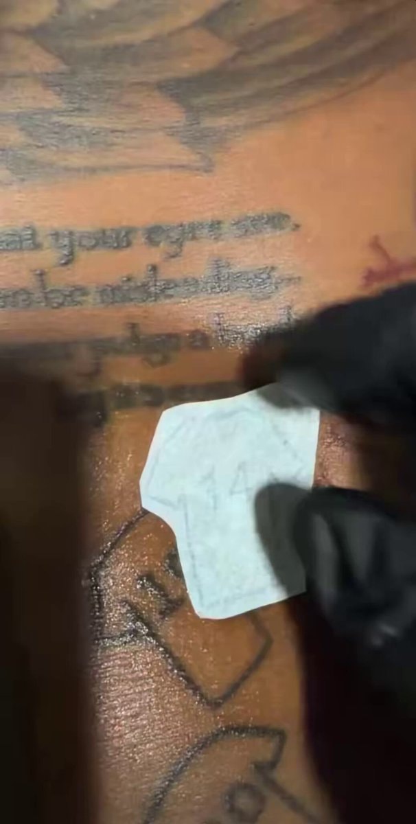 Marcus Rashford 14 tattoo