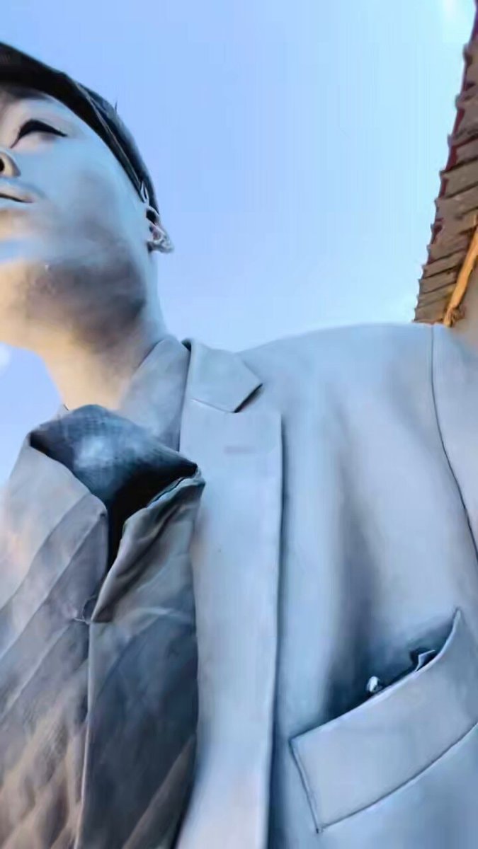 metallic statue in suit metallic statue in suit