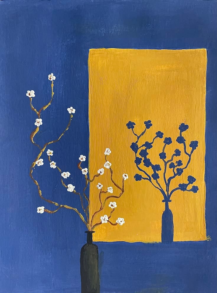 two vases with flower branches