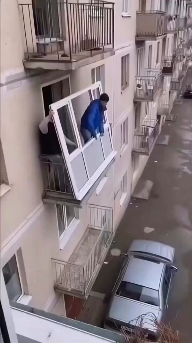 Glass balcony out a window