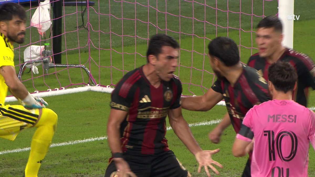 Atlanta player celebrates near Messi Atlanta player celebrates near Messi