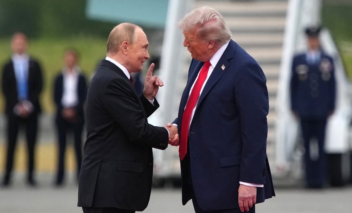 Trump Putin handshake