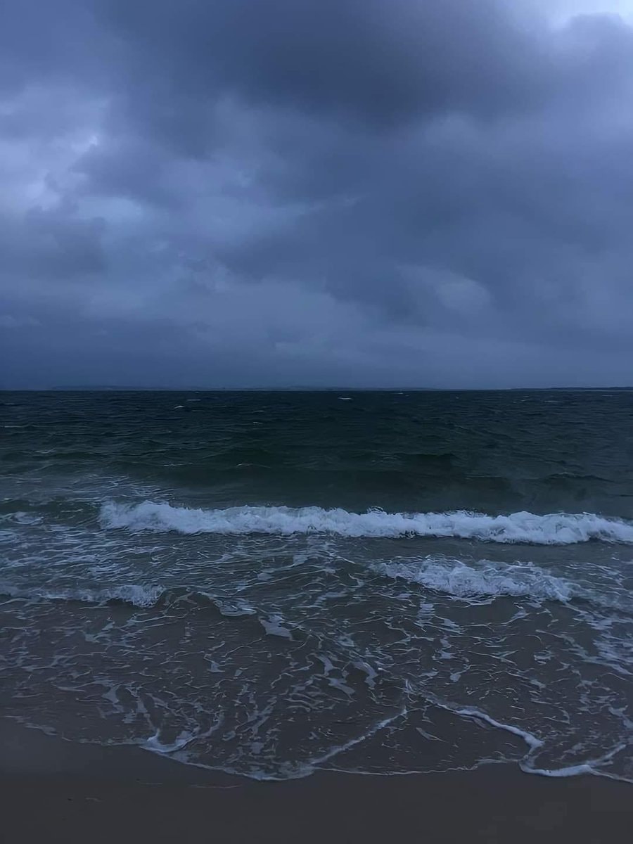 Stormy seascape under dark clouds Stormy seascape under dark clouds