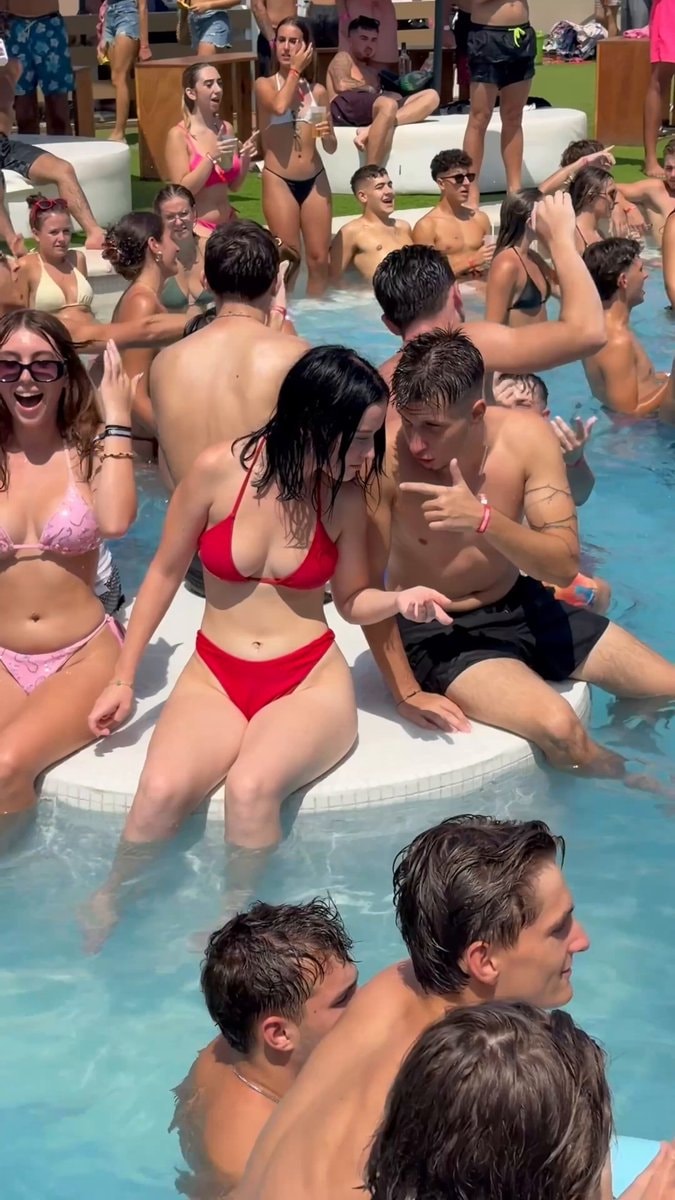 Red bikini pool party moment