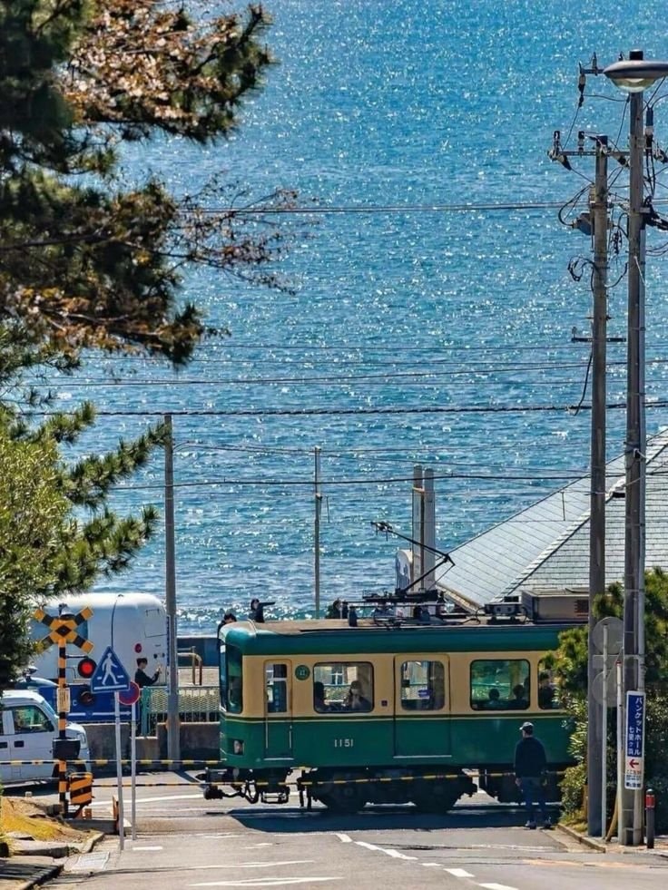Japan vintage tram coastal scene