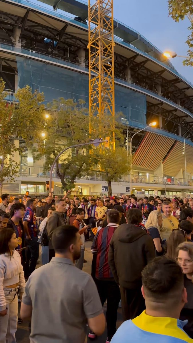 Barcelona fans wait for club bus